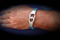 custom bracelet from Chrissie C with handcuff theme