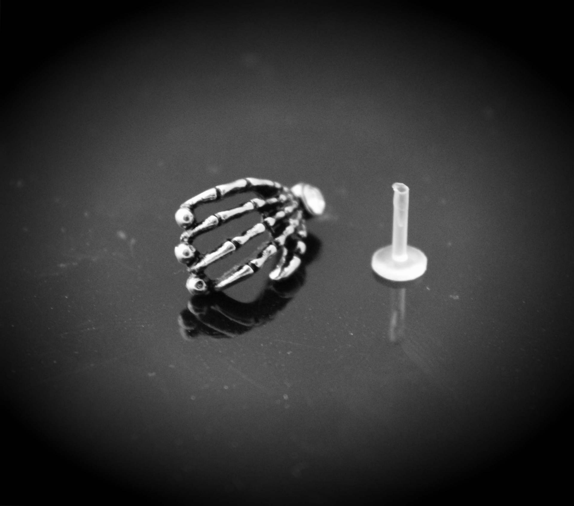 Skull Hand Bioplast Body Jewellery With Crystal Gem
