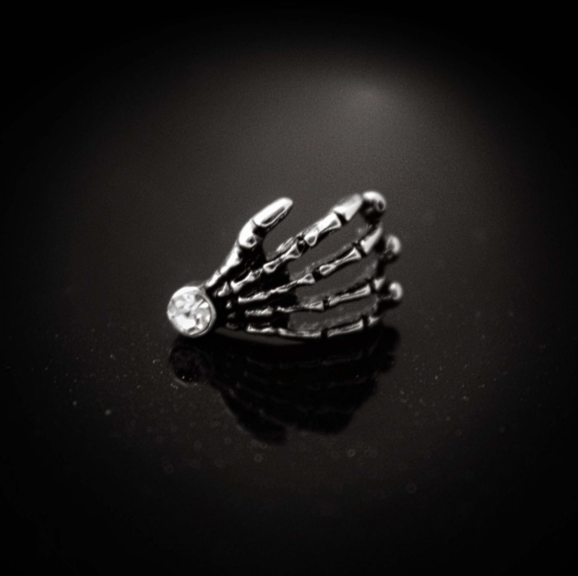 Skull Hand Bioplast Body Jewellery With Crystal Gem